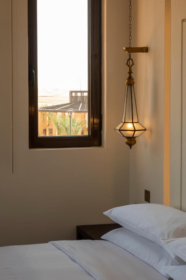 Al Badayer Retreat By Sharjah Collection Hotell Margham Exteriör bild A hanging lamp